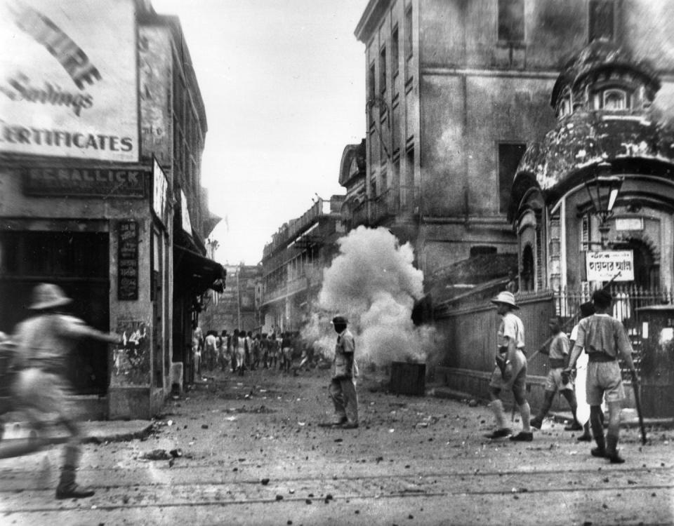 Police respond to unrest over Partition in Kolkata in 1946. <a href="https://www.gettyimages.com/detail/news-photo/calcutta-policemen-use-tear-gas-bombs-during-the-communal-news-photo/2628264?adppopup=true" rel="nofollow noopener" target="_blank" data-ylk="slk:Keystone/Getty Images;elm:context_link;itc:0;sec:content-canvas" class="link ">Keystone/Getty Images</a>