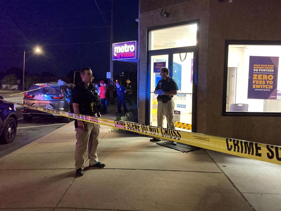 Police investigate the killing of Leslie Ruiz-Basilio at a Metro by T-Mobile store on Kirkwood Highway in May 2021.