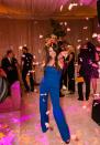 <p>Selena Gomez, who wore a blue, strapless jumpsuit for the occasion, danced at the couple's reception. </p>