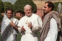 (FILES) Pope John Paul II is seen in this file picture taken 01 February 1986 in New Delhi as he meets India's Premier Rajiv Gandhi (r) and his wife Sonia at the beginning of his ten-day visit to India. (Photo credit should read MICHEL SCOTTO/AFP via Getty Images)