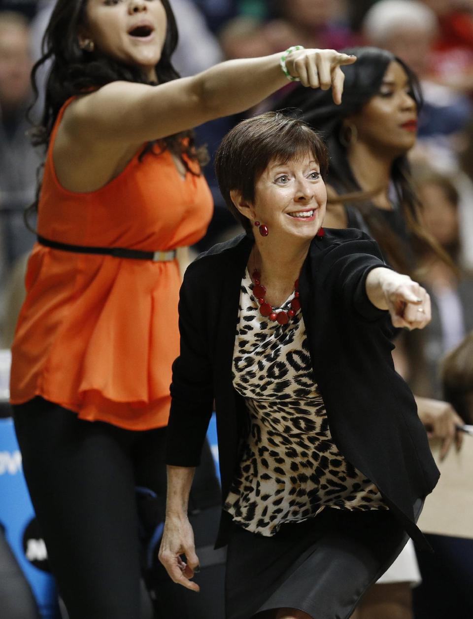 Notre Dame head coach Muffet McGraw works against Connecticut during the first half of the championship game in the Final Four of the NCAA women's college basketball tournament, Tuesday, April 8, 2014, in Nashville, Tenn. (AP Photo/Mark Humphrey)