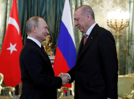 FILE PHOTO: Russian President Vladimir Putin and Turkish President Tayyip Erdogan meet in Moscow