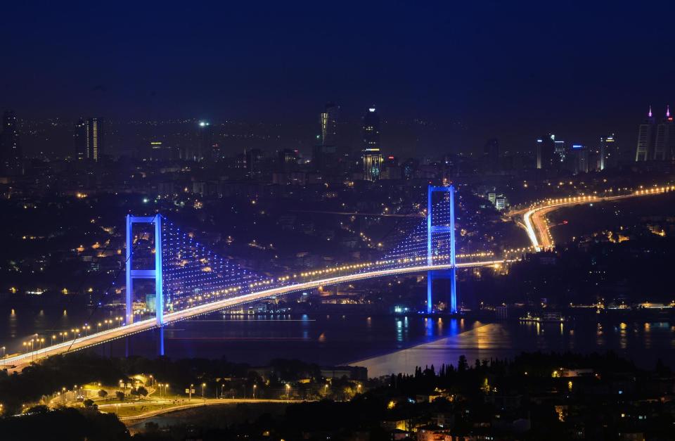 FILE - This Oct. 11, 2013 file photo shows the Bosporus Bridge which connects the Asian, right, and European sides of the city in Istanbul, Turkey. Last summer, Istanbul’s Taksim Square was the scene of violent confrontations between police and protesters. But protests have faded, and contrary to some lingering perceptions, it’s quite calm now _ except for the normal hustle and bustle found in this vibrant city. And it’s as safe for tourists as it ever was. Istanbul is a thoroughly modern place, but it traces its roots back to 660 B.C. It’s the former seat of the opulent Byzantine and Ottoman empires and is divided into European and Asian sides by the Bosporus Strait, offering a wealth of history and stunning scenery.(AP Photo/File)