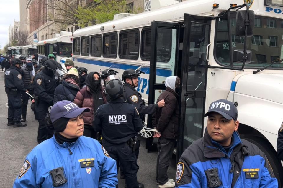 At least 100 protesters were hauled away Thursday. Matt McDermott for NY Post