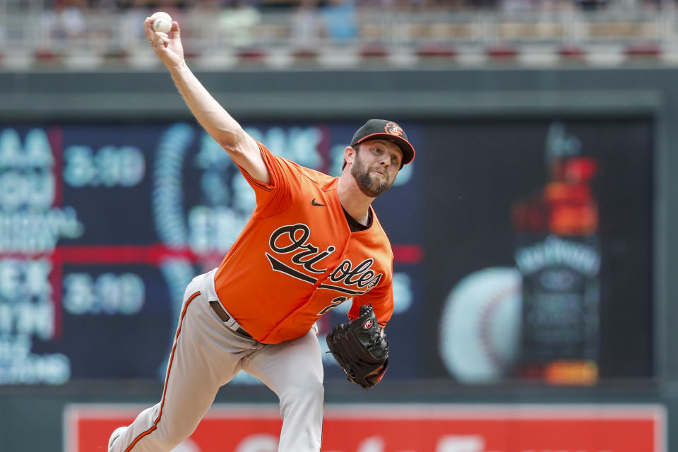 Baltimore Orioles starting pitcher Jordan Lyles throws to the Minnesota Twins in the first inning of a baseball game Saturday, July 2, 2022, in Minneapolis. (AP Photo/Bruce Kluckhohn)