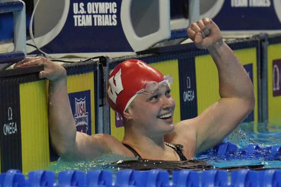 Phoebe Bacon reacts after finishing second in the women's 200 backstroke during wave 2 of the U.S. Olympic Swim Trials on Saturday, June 19, 2021, in Omaha, Neb. (AP Photo/Jeff Roberson)