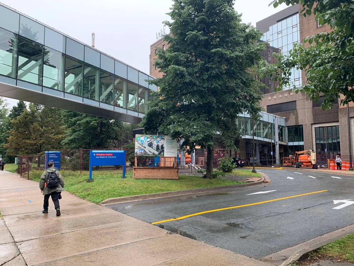 Work at the Halifax Infirmary has so far included a new pedway linking the hospital and a new parking garage and renovations to the entrances on Summer Street and Robie Street. (Michael Gorman/CBC - image credit)