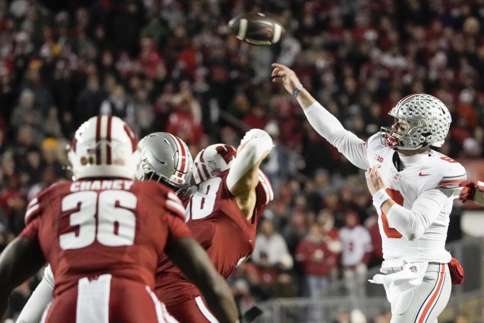 Ohio State's Cade Stover (8) throws during the first half of an NCAA college football game against Wisconsin Saturday, Oct. 28, 2023, in Madison, Wis. (AP Photo/Morry Gash)