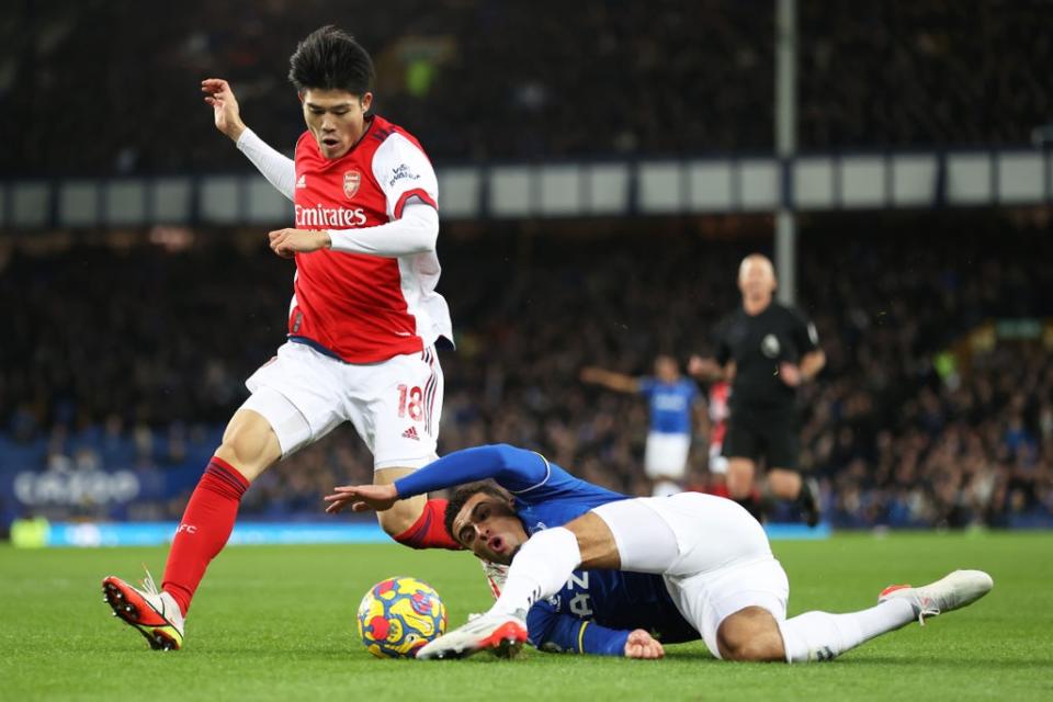 Tomiyasu and Godfrey battled for the ball throughout the match (Getty Images)