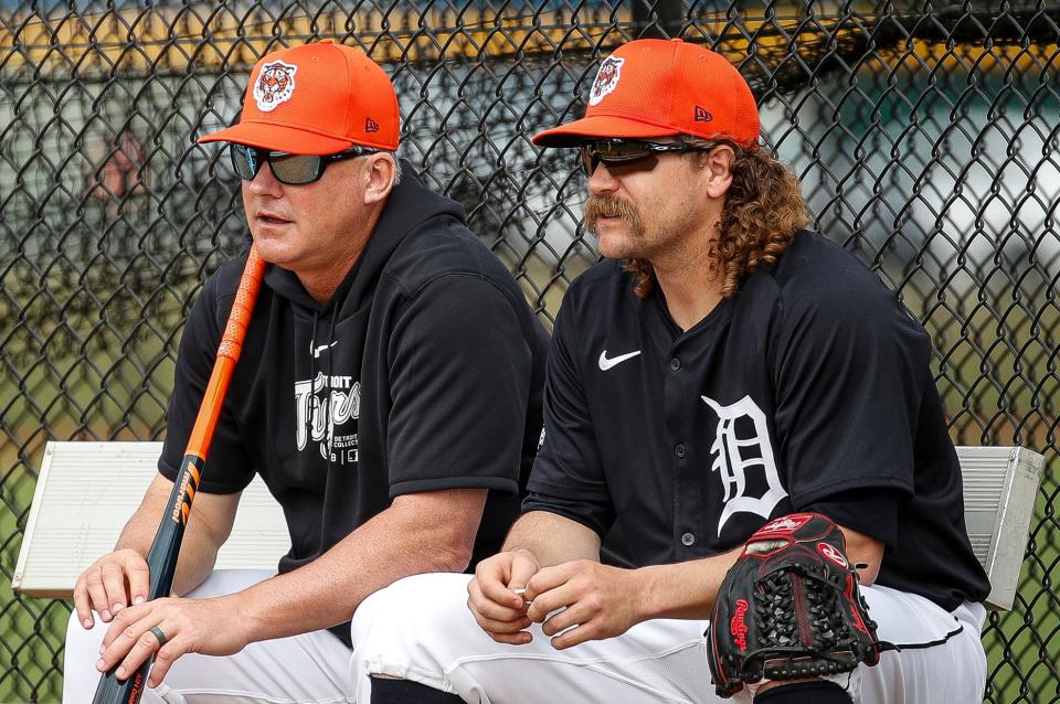 Detroit Tigers manager A.J. Hinch talks to pitcher Andrew Chafin during Spring Training at Tigertown in Lakeland, Fla. on Thursday, Feb. 15, 2024.