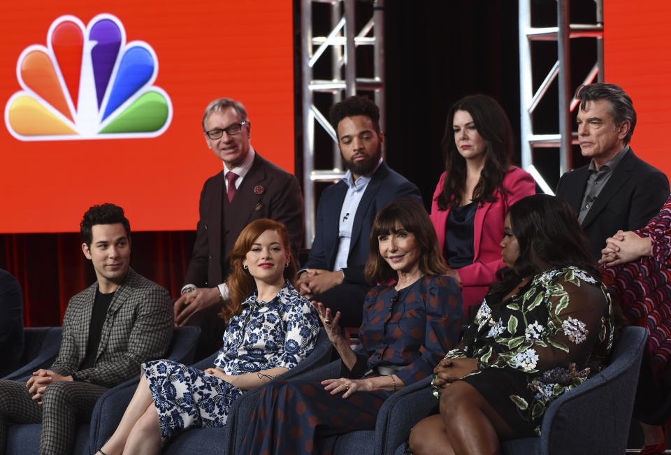 FILE - In this Jan. 11, 2020, file photo, Mary Steenburgen, second from right in the bottom row, a cast member in the NBCUniversal series "Zoey's Extraordinary Playlist," discusses the show at the 2020 NBCUniversal Television Critics Association Winter Press Tour, in Pasadena, Calif. Looking on from left in the front row are cast members Skylar Astin, Jane Levy and Alex Newell. From left in the back row are executive producer Paul Feig and cast members John Clarence Stewart, Lauren Graham and Peter Gallagher. Levy stars as Zoey, a computer coder who hears people’s private thoughts through pop songs, in the series airing 9 p.m. EST Sunday, Feb. 16, on NBC. (AP Photo/Chris Pizzello, File)