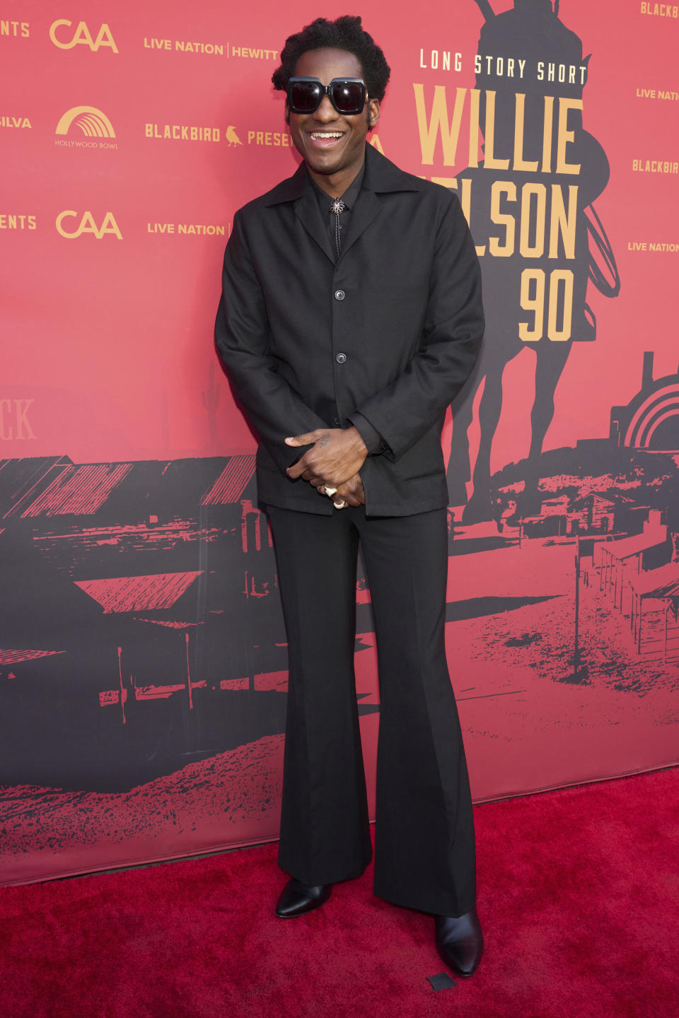 Leon Bridges arrives at Willie Nelson 90, celebrating the singer's 90th birthday, on Saturday, April 29, 2023, at the Hollywood Bowl in Los Angeles. (Photo by Allison Dinner/Invision/AP)