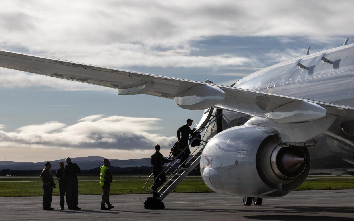 RAF aircrew board a Poseidon P-8A maritime patrol aircraft. British Poseidons have lately been in contact with a Russian submarine off the coast of Ireland, which has no defences of its own and is not a Nato member