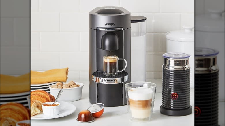 Nespresso VertuoPlus with espresso and pastry