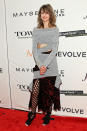 <p>The model stood out on the red carpet wearing a deconstructed look, consisting of a fitted tunic sweater, slashed skirt, and fishnet stockings. Someone’s got to mix it up, right? Her rumpled ‘do gave the outfit an easy-going, ‘90s feel—a trend that shows no sign of slowing down anytime soon. <br></p>