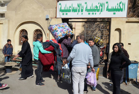 Christian families who left from Al-Arish in the North Sinai Governorate after the escalation of a campaign targeting Christians by Islamic State militants last week, arrive at the Evangelical Church in Ismailia, Egypt February 24, 2017. REUTERS/Ahmed Aboulenein