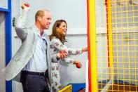 <p>Prince William and Kate Middleton have fun playing games at Island Leisure Amusement Arcade during their visit to Barry Island in South Wales on Wednesday.</p>