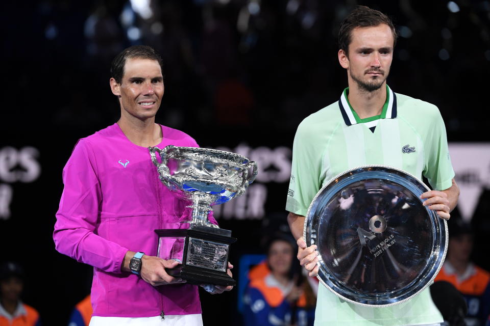 Pictured here, 2022 Australian Open finalists Rafael Nadal and Daniil Medvedev pose with their trophies.