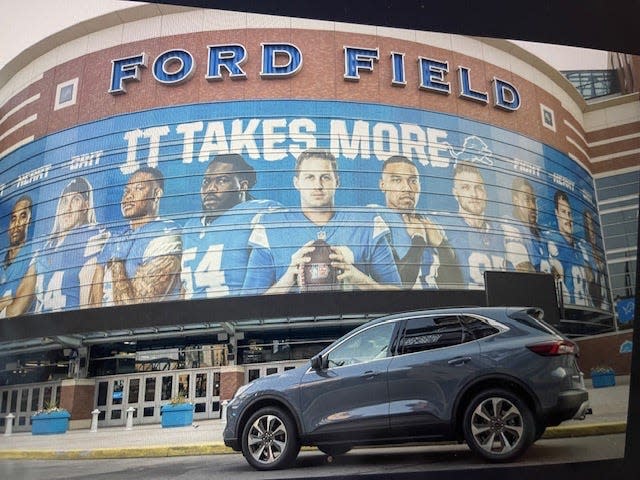 The 2024 Ford Escape hybrid, seen outside the home of the Detroit Lions, is celebrating its 20th year.