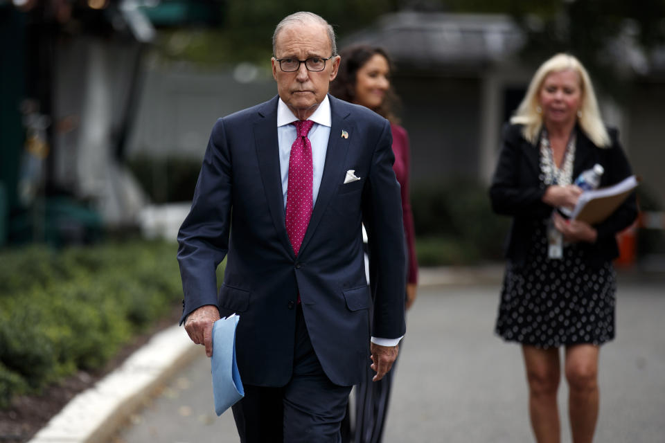 White House chief economic adviser Larry Kudlow walks to speak with reporters outside the White House, Friday, Sept. 6, 2019, in Washington. (AP Photo/Evan Vucci)
