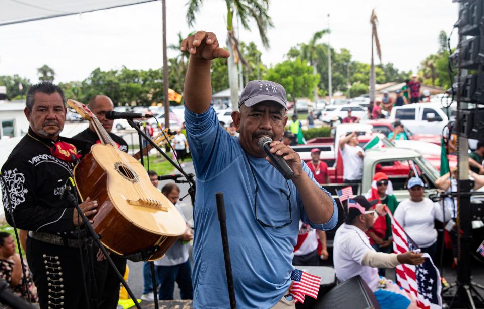 Lucas Benitez from the Coalition of Immokalee Workers speaks at a protest in Fort Myers on Wednesday, June 28, 2023. He was one of the leaders protesting the SB-1718 bill that goes into effect on July 1.