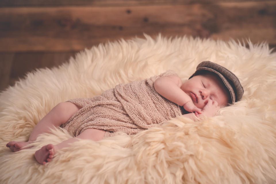 Baby with a cap on. (Getty Images)