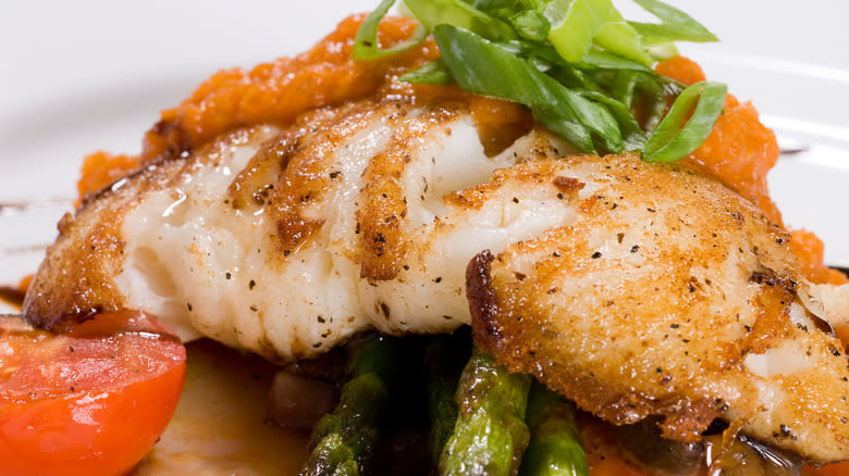 Pan roasted catfish fillet with vegetables