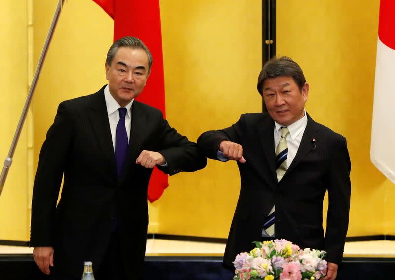 China's State Councilor and Foreign Minister Wang Yi meets with his Japanese counterpart Toshimitsu Motegi in Tokyo