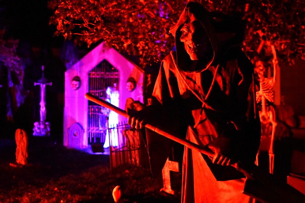 The Damschroders' home at 311 Maple St., Woodville, has a cemetery worth visiting this Halloween. Owners Steve and Lori Damschroder said the family goes “all out” with costumes and decorating for Halloween, their favorite time of the year.