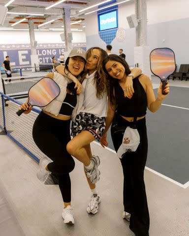 <p>Hot and Social/Instagram</p> Liv Schreiber is pictured alongside attendees at one of Hot and Social's pickleball events.