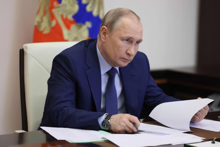 Russian President Vladimir Putin chairs a meeting on the road construction development via a video link at the Novo-Ogaryovo state residence, outside Moscow, on June 2, 2022. (Photo by Mikhail Metzel / SPUTNIK / AFP)