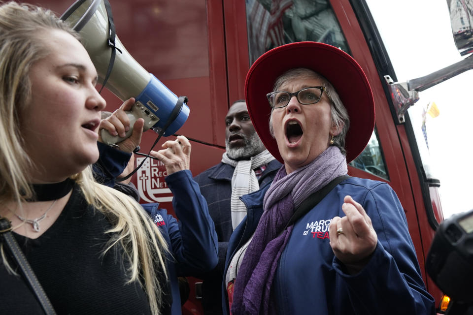 People attend a rally at Freedom Plaza Tuesday, Jan. 5, 2021, in Washington, in support of President Donald Trump. (AP Photo/Jacquelyn Martin)