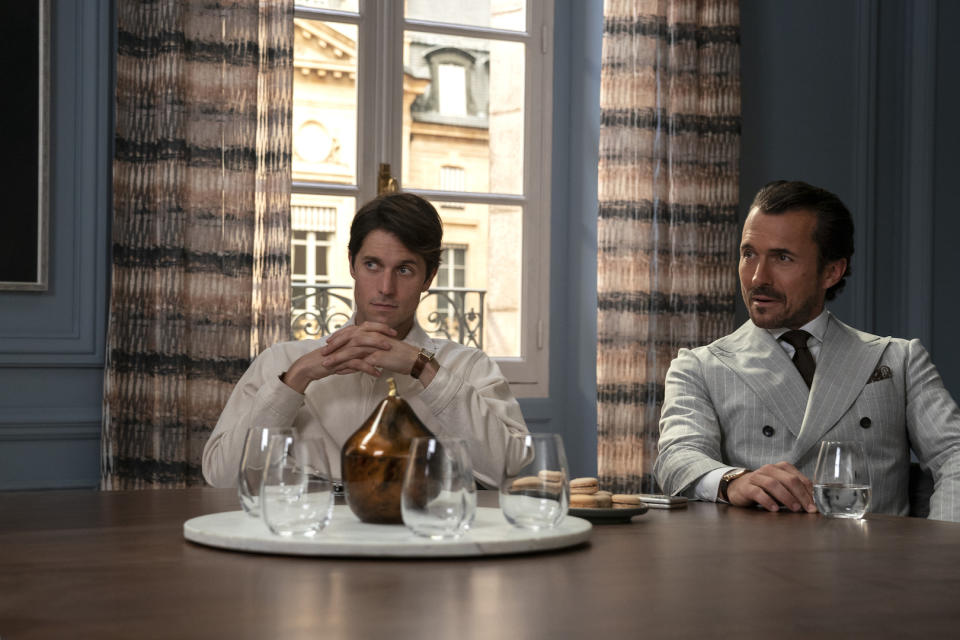 Emily in Paris. (L to R) Lucas Bravo as Gabriel, William Abadie as Antoine Lambert in episode 301 of Emily in Paris. Cr. Stéphanie Branchu/Netflix © 2022