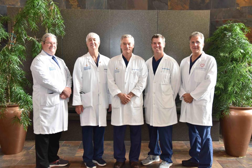 The Cardiovascular Surgery Program at Portsmouth Regional Hospital is celebrating its 25th anniversary. It is the only hospital on the Seacoast to offer open-heart surgery and to be designated as a Chest Pain Center by the American College of Cardiology. From left: Mark Sullivan, PAC; William Wilson, MD; Robert Helm, MD, chief of cardiovascular surgery; Christopher Terrien, MD; and Kevin McCusker, PhD.