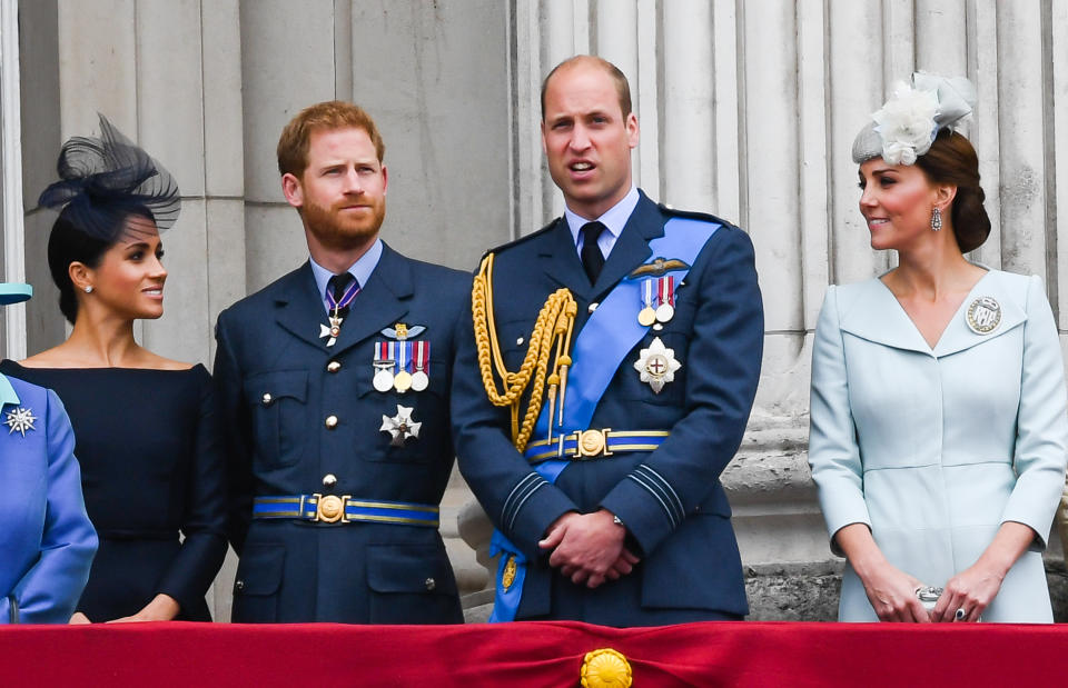 Meghan and Kate talk while Harry and William watch Trooping the Colour