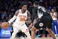 New York Knicks forward Julius Randle (30) drives against Los Angeles Clippers forward Marcus Morris Sr. (8) in the first half of an NBA basketball game, Saturday, Feb. 4, 2023, at Madison Square Garden in New York. (AP Photo/Mary Altaffer)