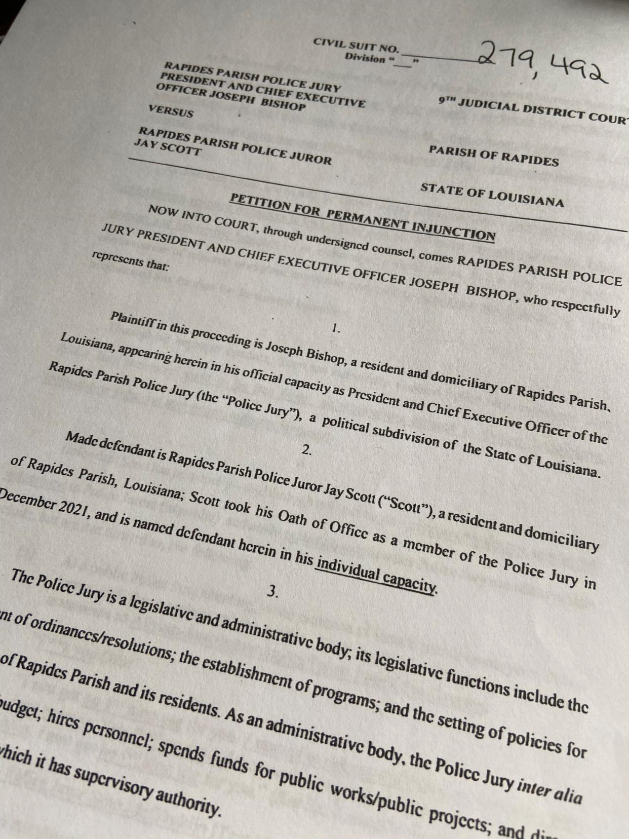 The Rapides Parish Police Jury is seeking a permanent injunction against one of its own members, Jay Scott, alleging that he has threatened and harassed fellow jurors and employees.