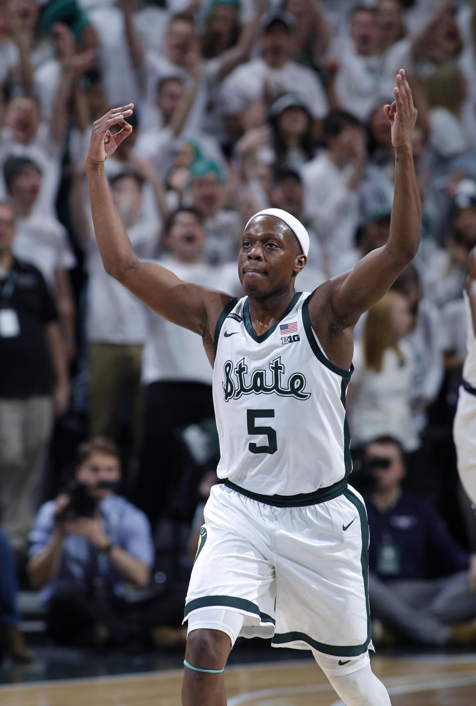 Michigan State's Cassius Winston reacts after sinking a three-point basket against Michigan during the second half of an NCAA college basketball game, Sunday, Jan. 5, 2020, in East Lansing, Mich. (AP Photo/Al Goldis)