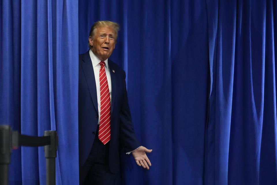 Republican presidential candidate former President Donald Trump arrives to speak at a rally at Des Moines Area Community College in Newton, Iowa, Saturday, Jan. 6, 2024. (AP Photo/Andrew Harnik)