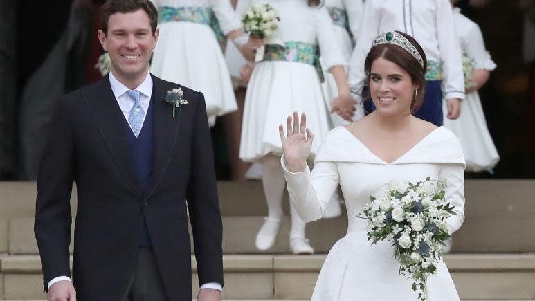 The bride donned a beautiful gown with a low back designed to show off her scar from surgery to correct her scoliosis.