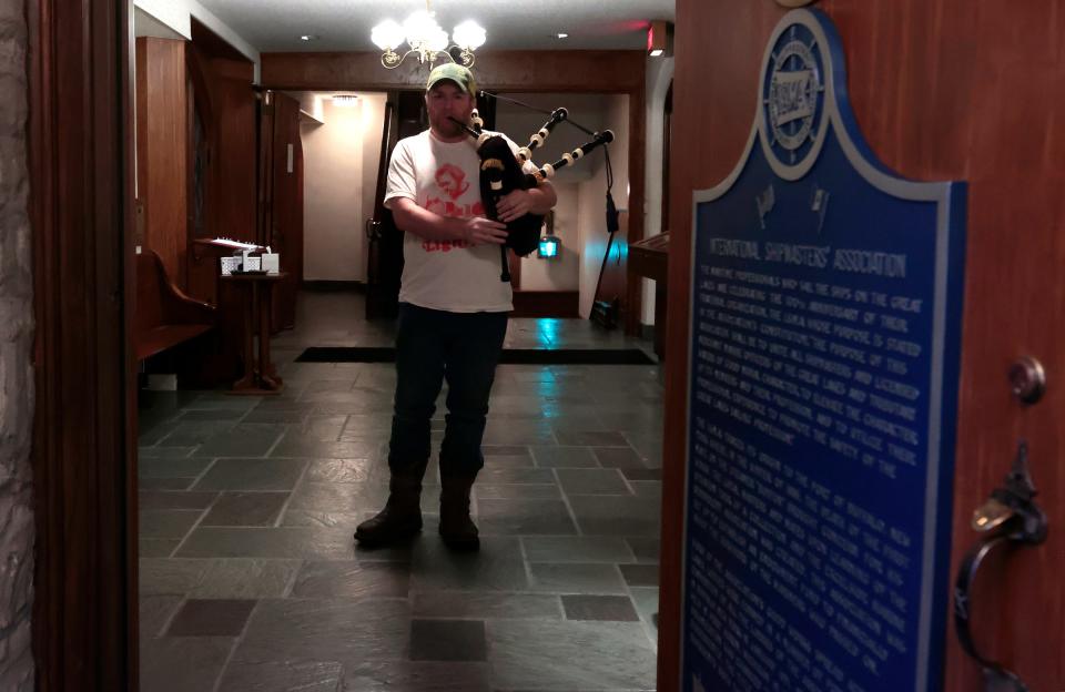 Ian Kushnir, 37 of Dearborn, plays "Amazing Grace" on his bagpipes after the bell was rung at the Mariners' Church of Detroit on Jefferson Avenue in downtown Detroit on Tuesday, May 2, 2023. The bell was rung in total 30 times, 29 for those sailors lost in the sinking of the Edmund Fitzgerald freighter on Lake Superior in 1975 and one final bell for the Canadian singer and songwriter Gordon Lightfoot whose song "The Wreck of the Edmund Fitzgerald" tells the story of the tragedy.