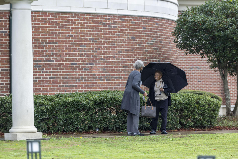 Voters greet one another during a primary election, Tuesday, March 5, 2024, at Stillman College's Cordell Wynn Humanities & Fine Arts Center, Tuscaloosa County Ward 36, in Tuscaloosa, Ala. (AP Photo/Vasha Hunt)