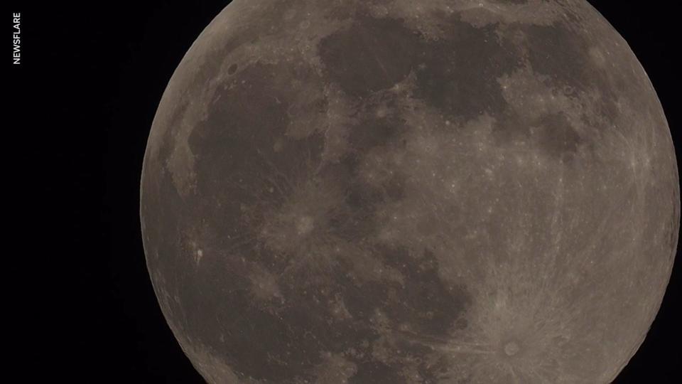 A close-up of the pink super moon is captured over Sheerness, Kent, in the U.K.