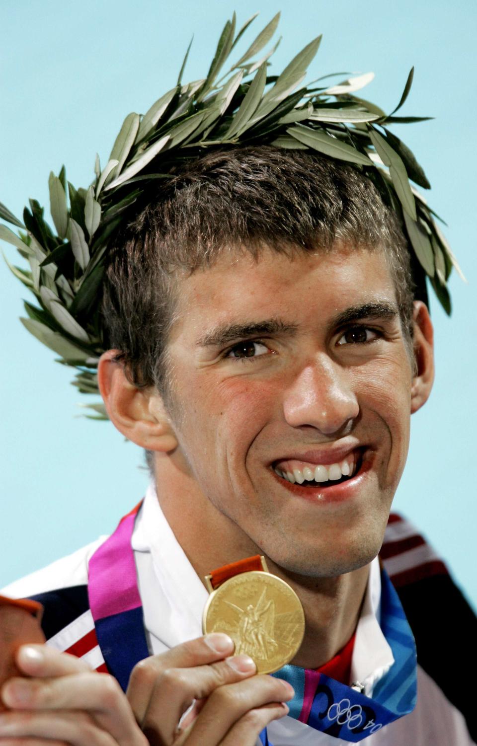 美國的Michael Phelps 在雅典奧運男子200米蝶式獲得金牌。(圖片來源：達志影像)