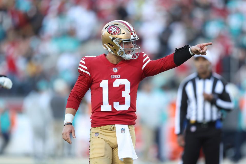 San Francisco 49ers quarterback Brock Purdy (13) celebrates after a touchdown in the third quarter during an NFL football game against the Miami Dolphins, Sunday, Dec. 04, 2022 in Santa Clara, Calif. (AP Photo/Lachlan Cunningham)