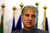 FILE PHOTO: Pakistani Foreign Minister Shah Mehmood Qureshi listens during a news conference at the Foreign Ministry in Islamabad