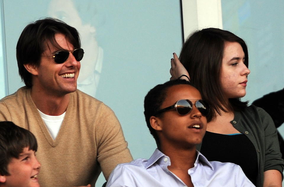 Tom Cruise with Connor and Isabella Cruise at a soccer game in July 2009. They resided with him after his divorce from Nicole Kidman. (Photo: Gabriel Bouys/AFP/Getty Images)