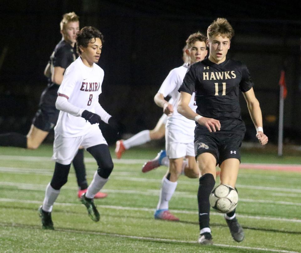 Corning's Carter Rosno (11) controls the ball during a 4-0 win over Elmira in the Section 4 Class AA boys soccer final Oct. 28, 2022 at Waverly Memorial Stadium.