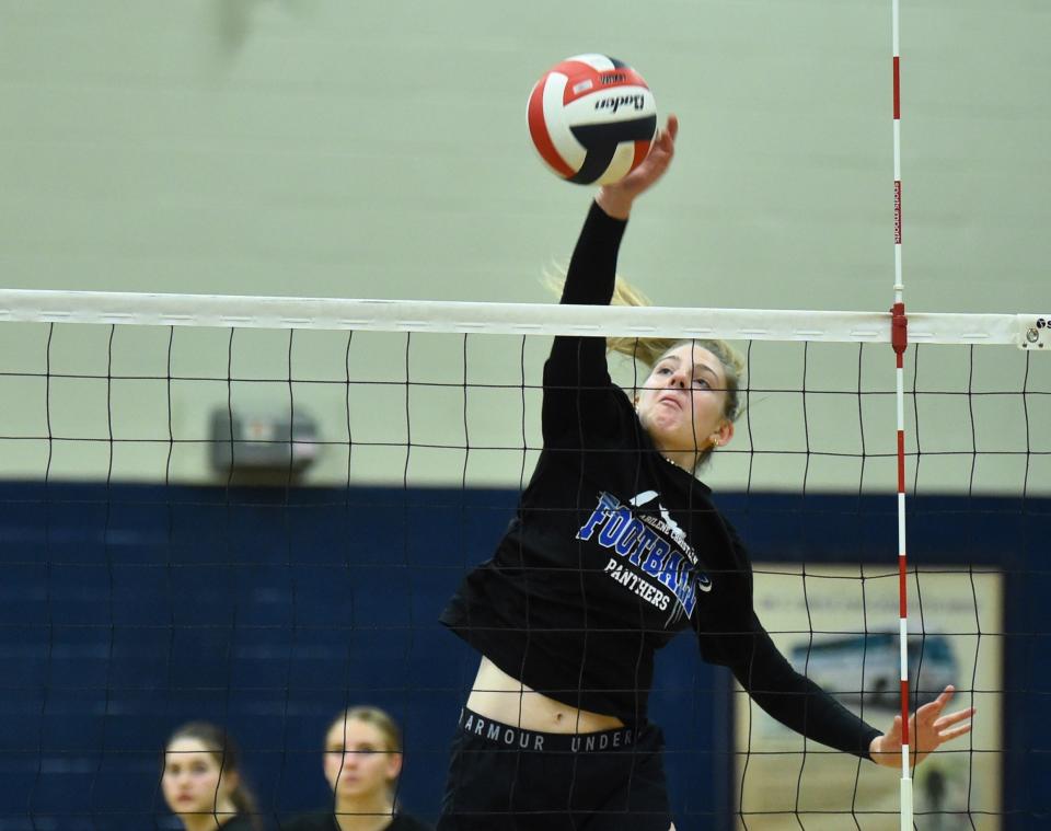 bilene Christian senior Halle Bruntmyer spikes the ball during practice Monday at the ACHS gym.
