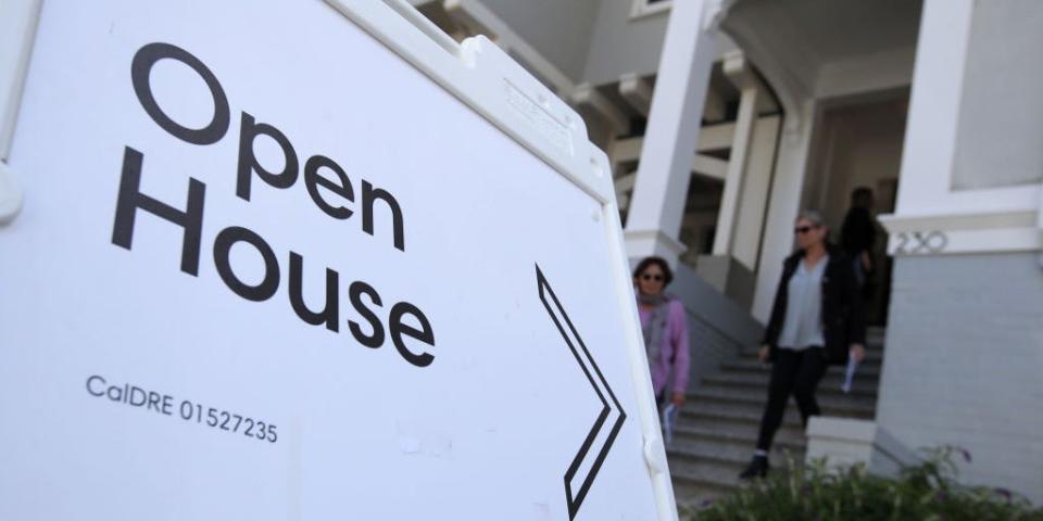 Real estate agents leave a home for sale during a broker open house on April 16, 2019 in San Francisco, California.